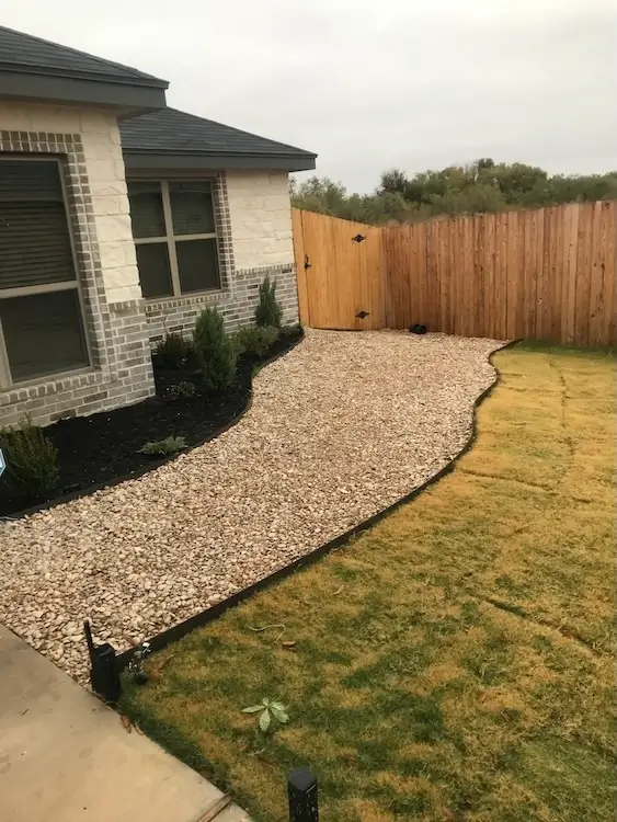 River rock and mulch in front yard